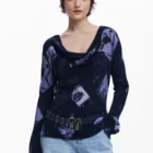 Desigual long-sleeved blue viscose blouse with collage print Desigual long-sleeved blue viscose blouse with collage print