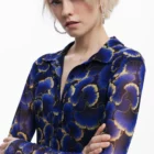 Desigual short chiffon dress with long sleeves and pleated ruffle skirt by Christian Lacroix Desigual short chiffon dress with long sleeves and pleated ruffle skirt by Christian Lacroix